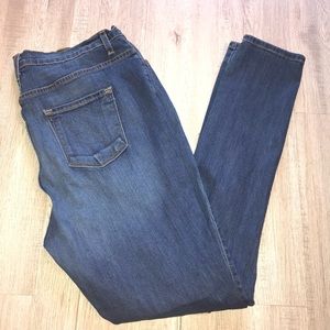 Plus size medium wash stretch distressed jeans